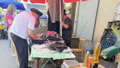 Более 100 шапок и кепок изъяли у незаконного торговца в парке Ессентуков